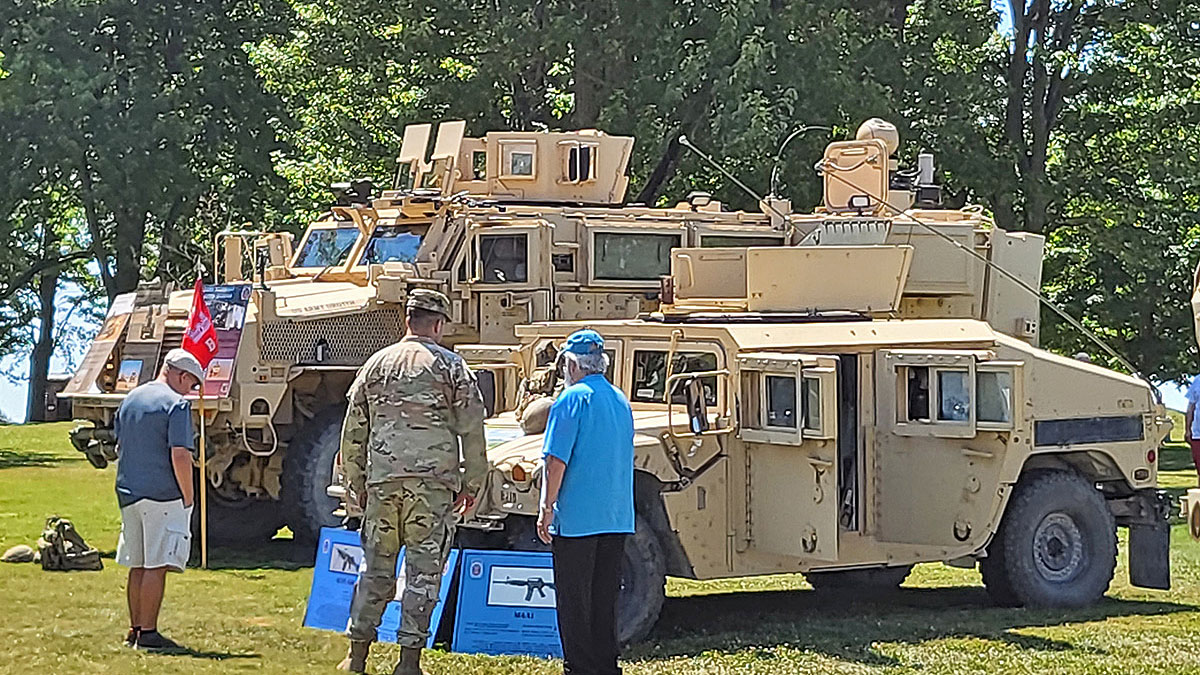 Photo of US Army vehicles displayed by the 10th Mountain Division at the Sackets Harbor Battlefield State Historic Site