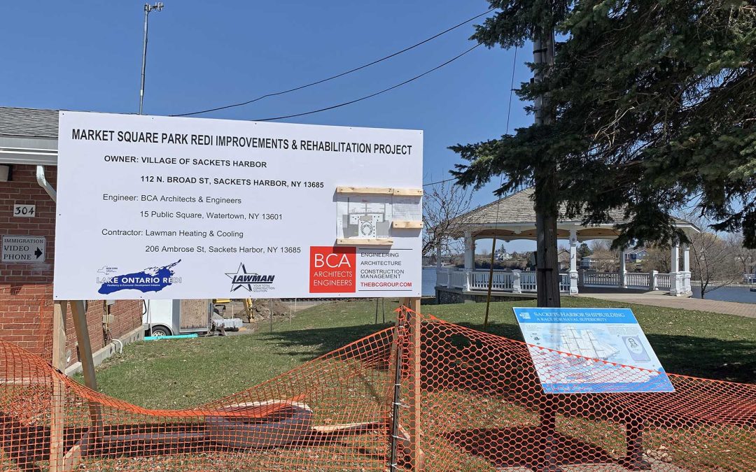 Photo of construction and construction sign at Market Square Park and the Bandstand in Sackets Harbor