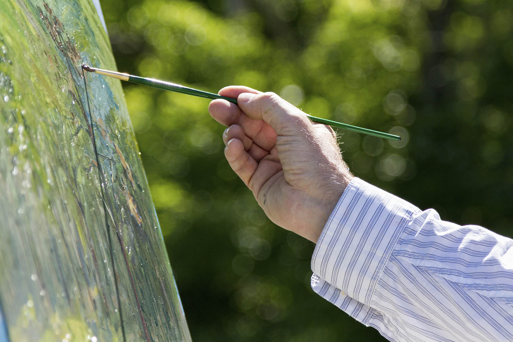 Photo of an artist painting