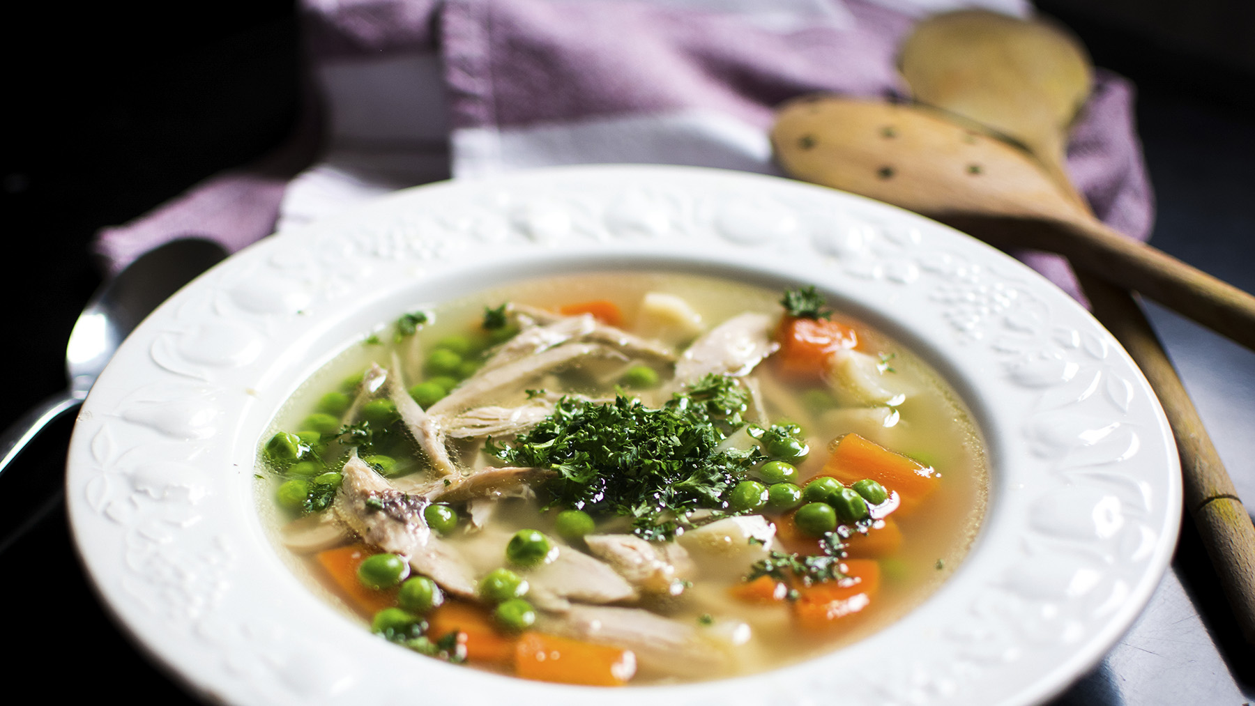 Stock photo of a bowl of chicken and vegetable broth soup from Creative Commons (courtesy of RawPixel.com)