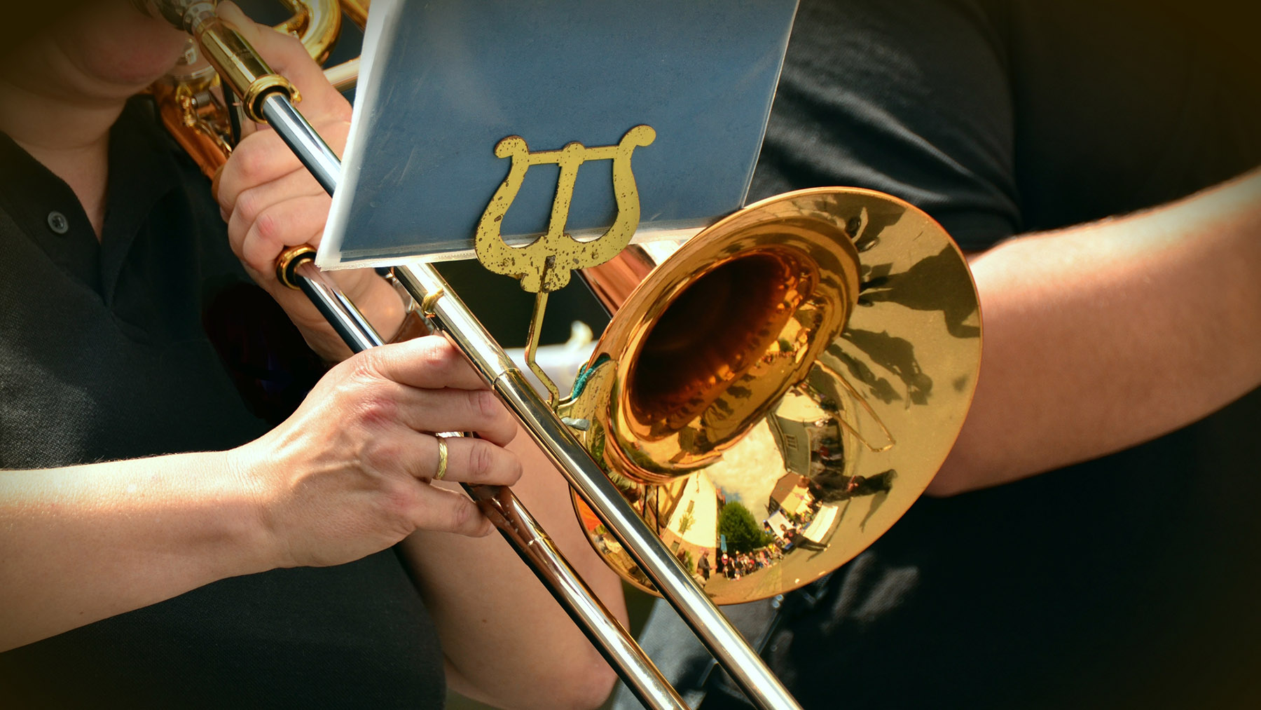 Stock photo of a musician playing the trombone