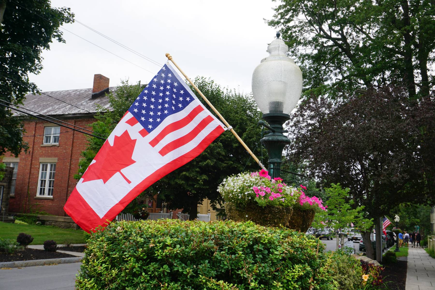 Photo of the Can-Am Festival Flag in downtown Sackets Harbor