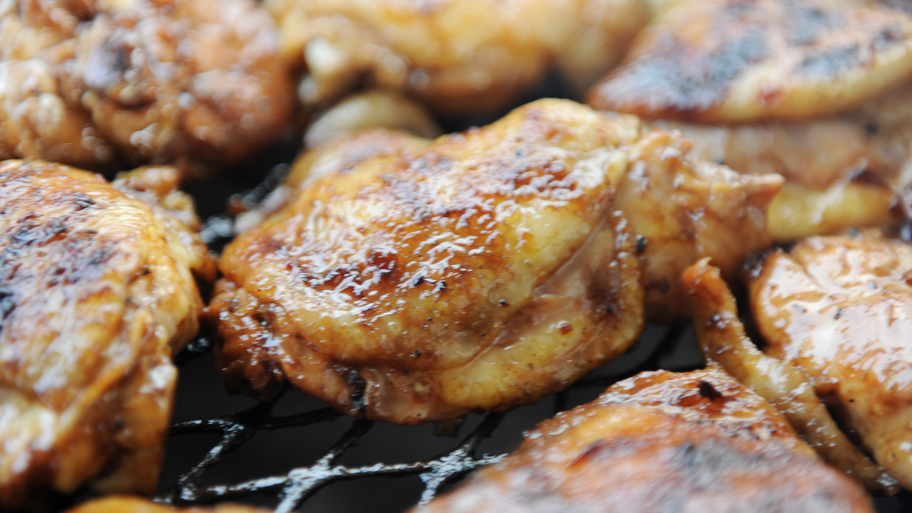 Stock image of chicken grilling on a barbeque (Image by RawPixel.com)