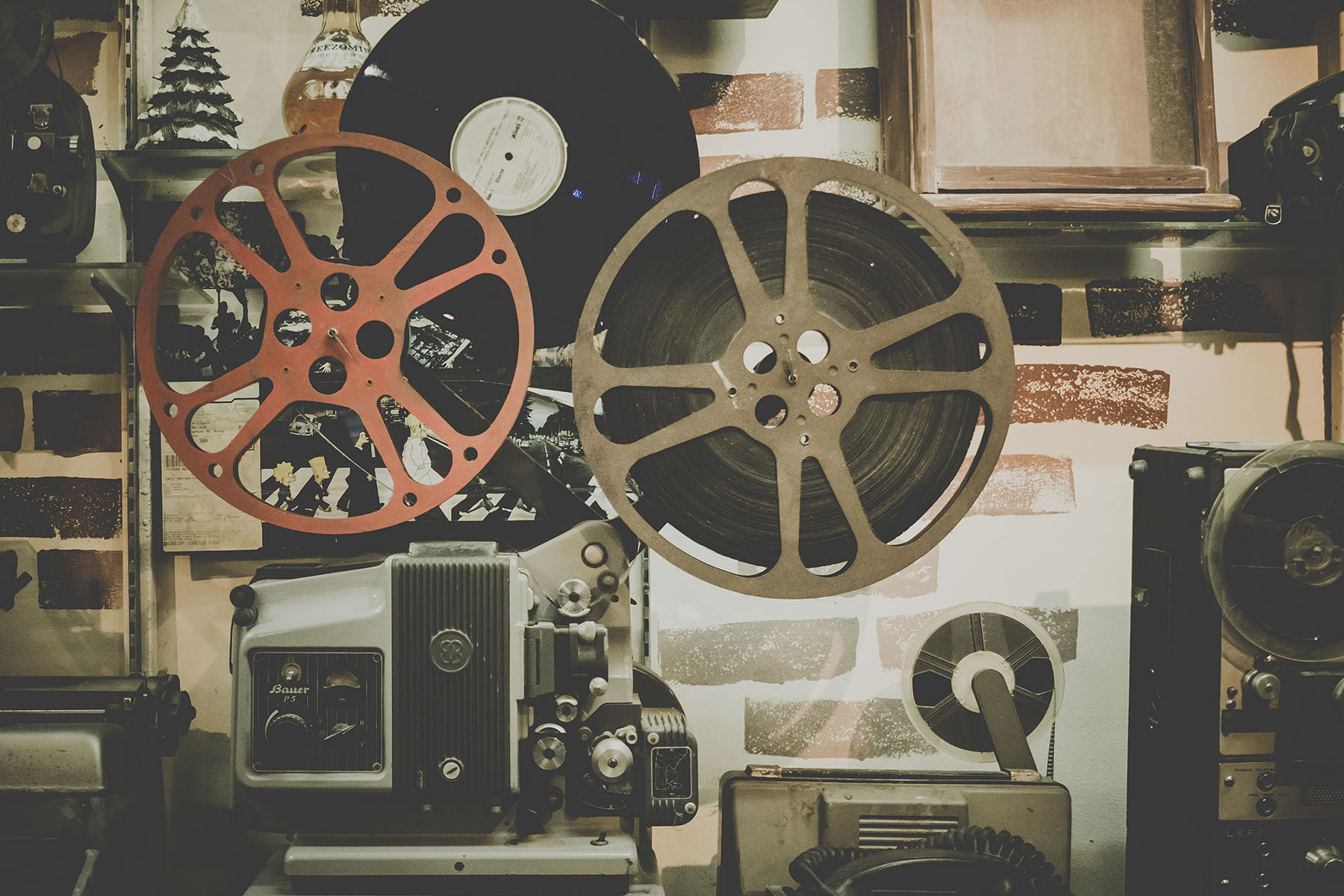Stock photo of a film projector with multiple reels from RawPixel.com